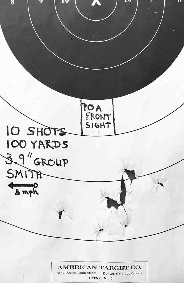 This is a 10-shot group with no wiping during the entire string, and it measured 3.9 inches. Extra beeswax and tallow lube (soft) was smeared around the ogive/nose of each bullet before chambering. It flows rearward upon firing. This helps to keep the bore cleaner and does not seem to affect the accuracy of my 10-shot strings. It reduces the number of flyers caused by hard fouling.